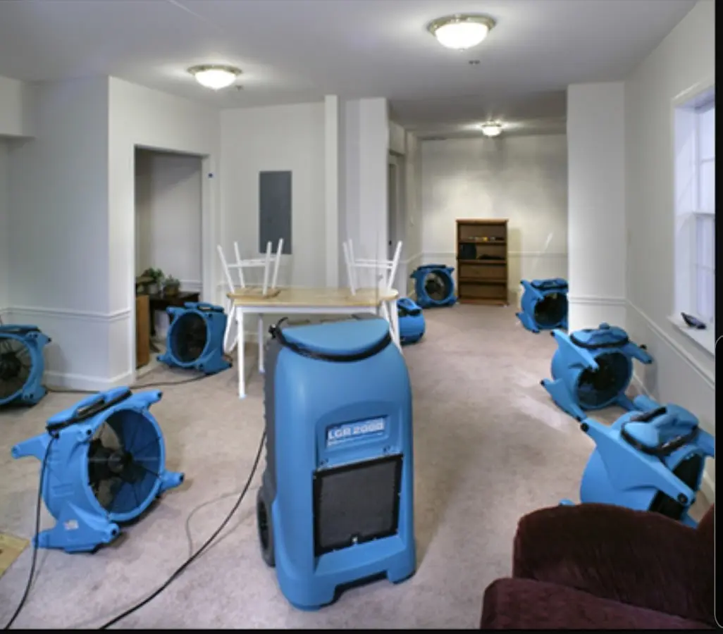 Air movers and dehumidifier setup for Water Extraction & Removal in Waupun